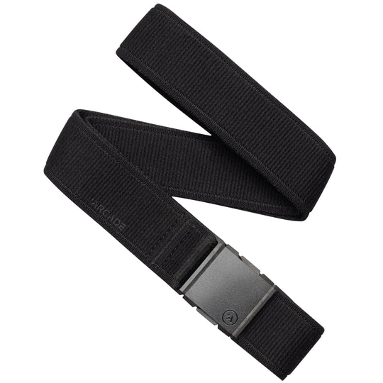The black Atlas belt by Arcade Belts features a fabric strap, a rectangular black plastic buckle, and subtle ARCADE embossing near the buckle, making it a stylish and practical choice for travel.