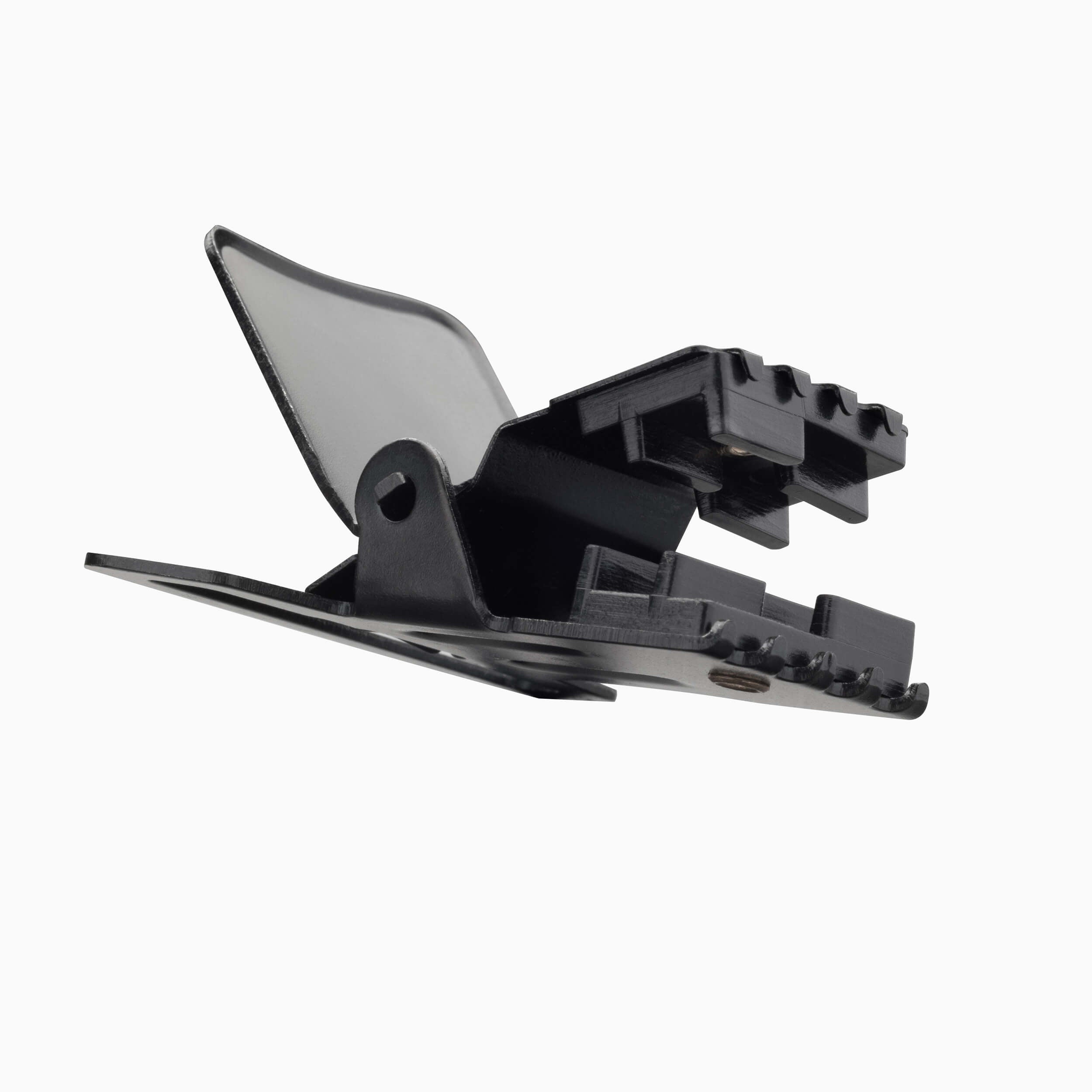 The Jessup hair clip by Arcade Belts features a black plastic design with a spring hinge—shown open against a white background. Pair it easily with your favorite Elastic Stretch Belt or Travel Belts for effortless, on-the-go style.