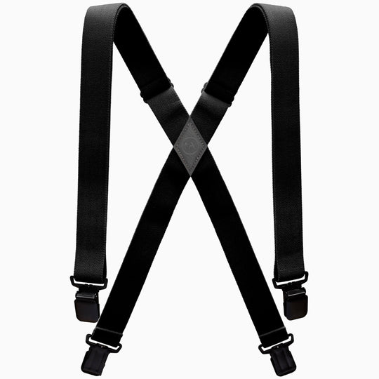 The Arcade Belts Jessup suspenders feature adjustable straps, metal clips, and stretch webbing for comfort, arranged in an X shape and shown in black against a white background.