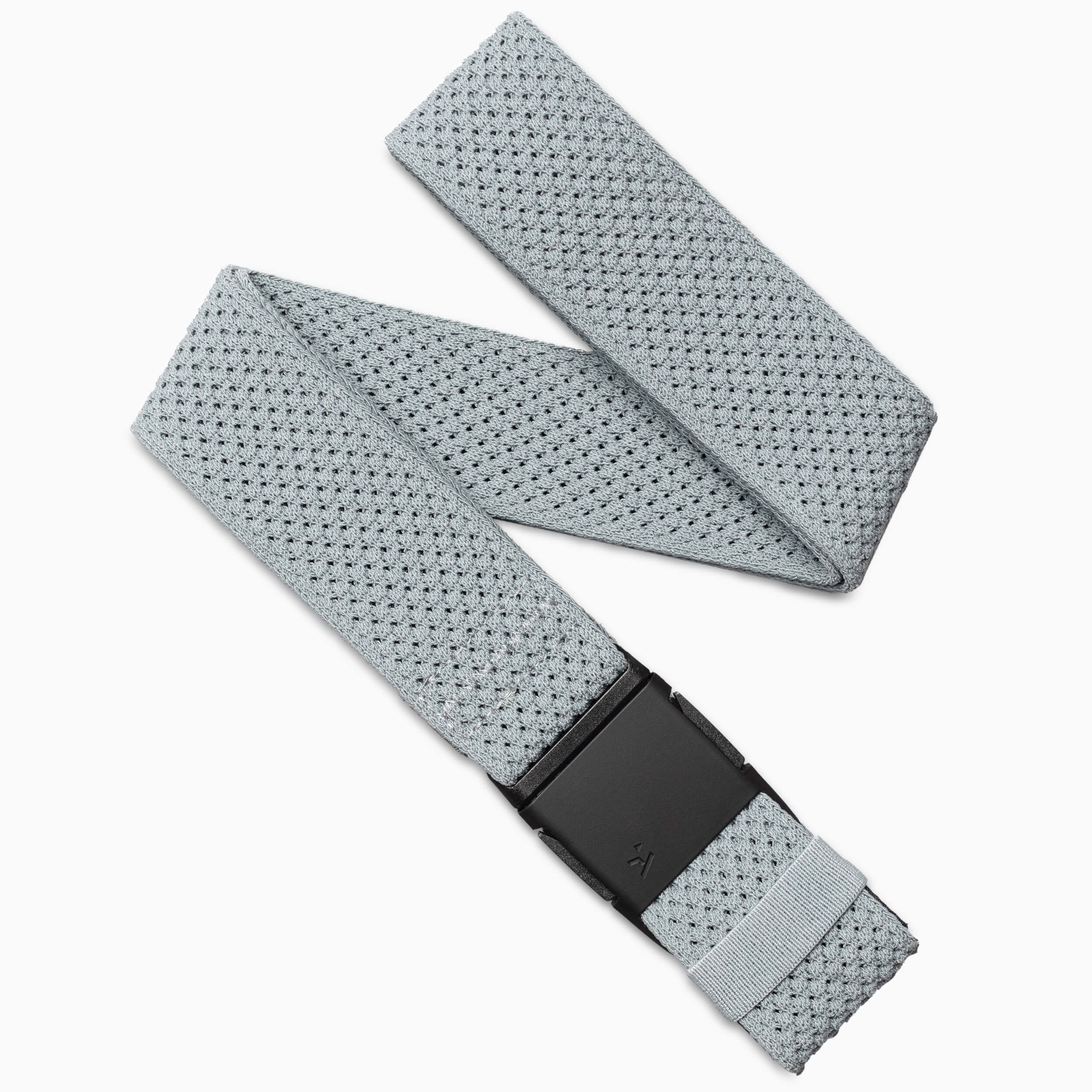 The Arcade Belts Momentum is a light gray woven stretch webbing belt with a textured pattern and a rectangular black plastic buckle, shown against a white background.