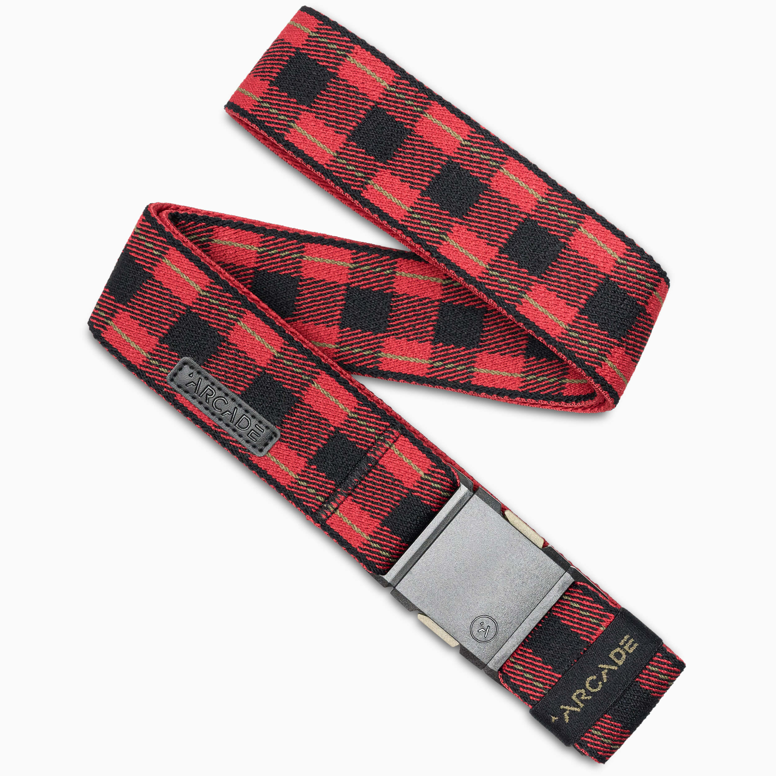 The Arcade Belts Plaid is a red and black plaid elastic stretch belt with a silver rectangular buckle and black ARCADE label, shown in a loose spiral to highlight its flexible webbing design.