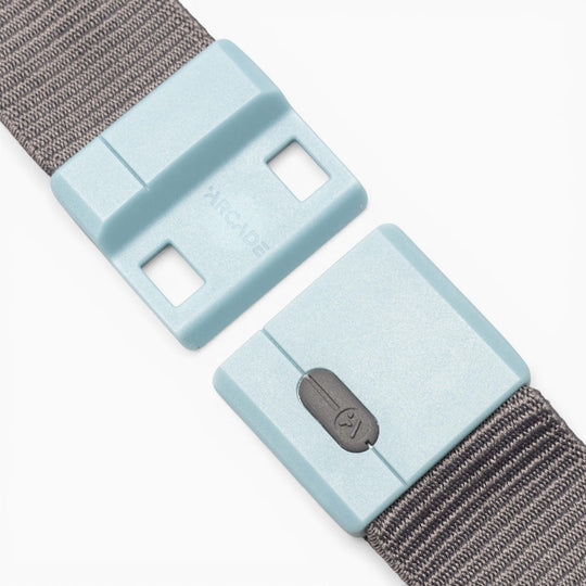 Magnetic buckle detail on the Polar Mag stretch belt in Charcoal/Cove by Arcade Belts