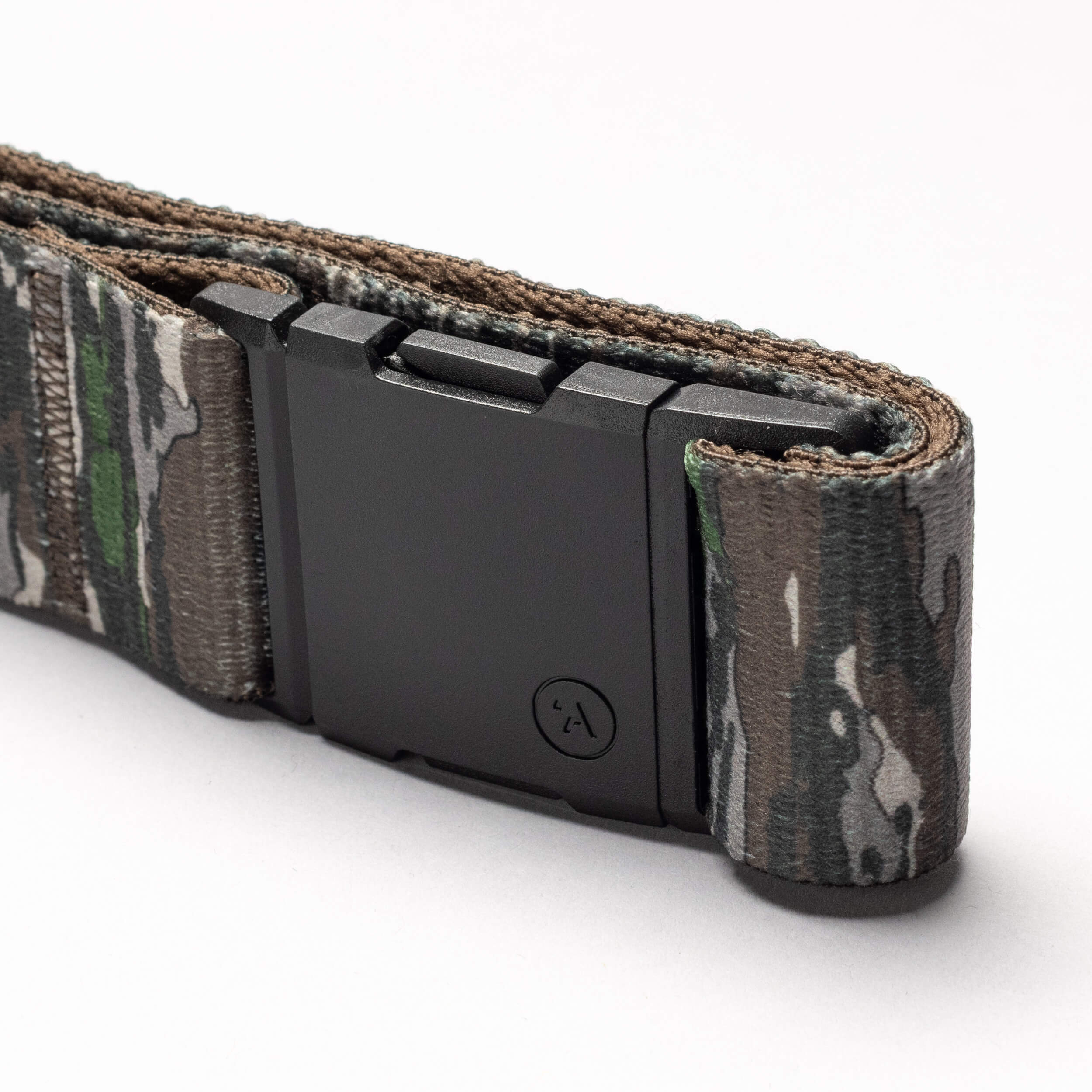 A close-up of the Arcade Belts Realtree Camo Original, featuring stretch webbing and a matte black rectangular buckle, displayed on a white background.