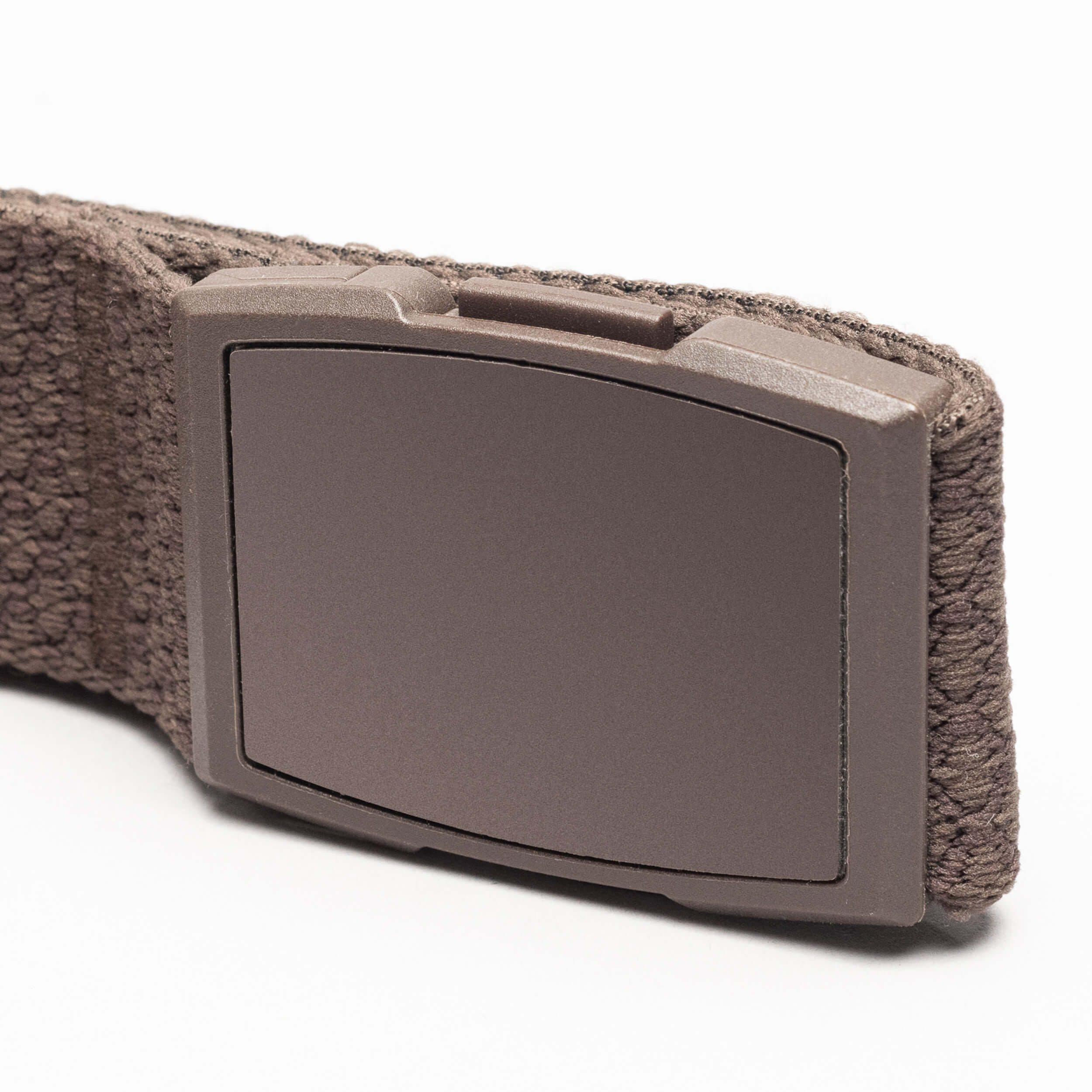 A close-up view of the Arcade Belts Salient, a brown elastic stretch belt with a large rectangular plain brown buckle, shown against a white background.