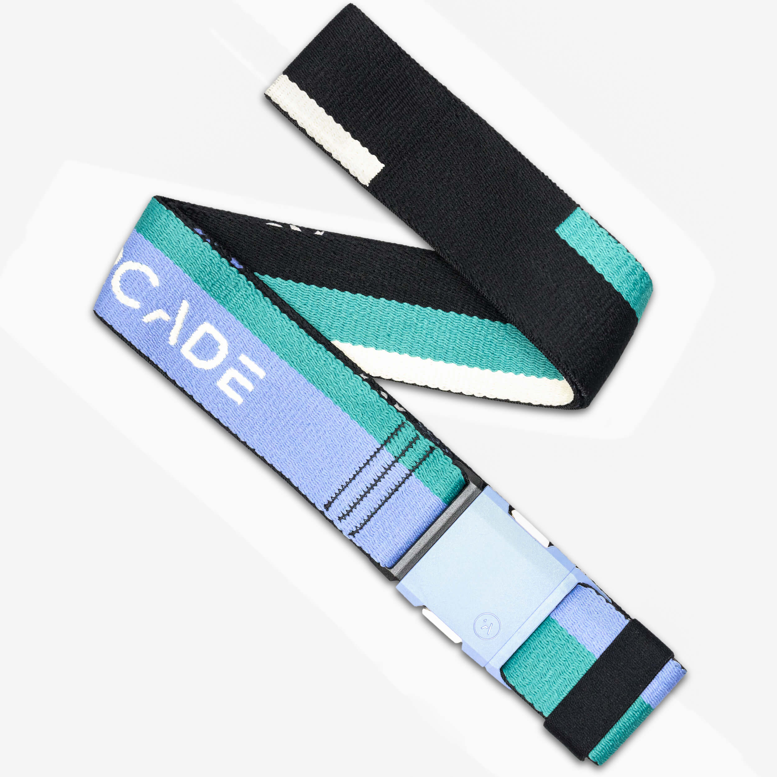 The Arcade Belts Sierra is a colorful, adjustable stretch webbing strap with teal, blue, black, and white sections, a light blue plastic buckle, and CADE in white—ideal for fun travel accessories.